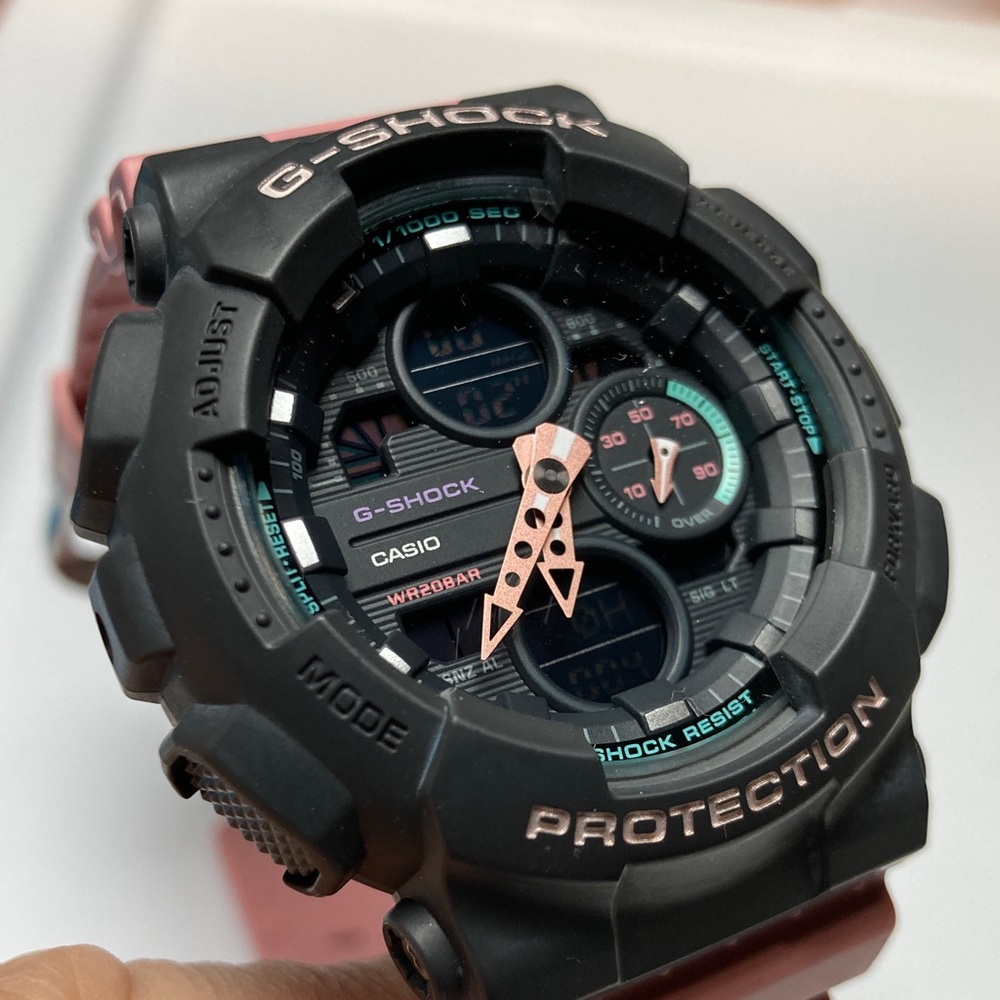Casio Gshock, GMA-S140, gray bezel, dusty pink strap and accents working battery